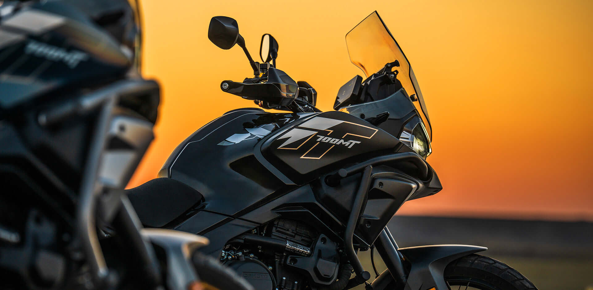 CFMOTO Mauritius 700MT motorcycle side view showcasing adventure design and touring features.